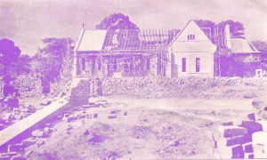 Lubwa Church. (With foundations of new hospital in the foreground.) Everything - bricks, tiles, couples, boards, windows, doors, etc. - made on the spot by native boys, under the supervision of Rev Dr Brown. Only glass, nails, locks etc. are imported